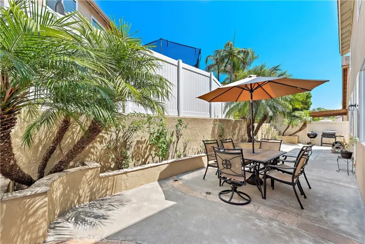 Newer vinly fencing surround the home.  Low maintenance.