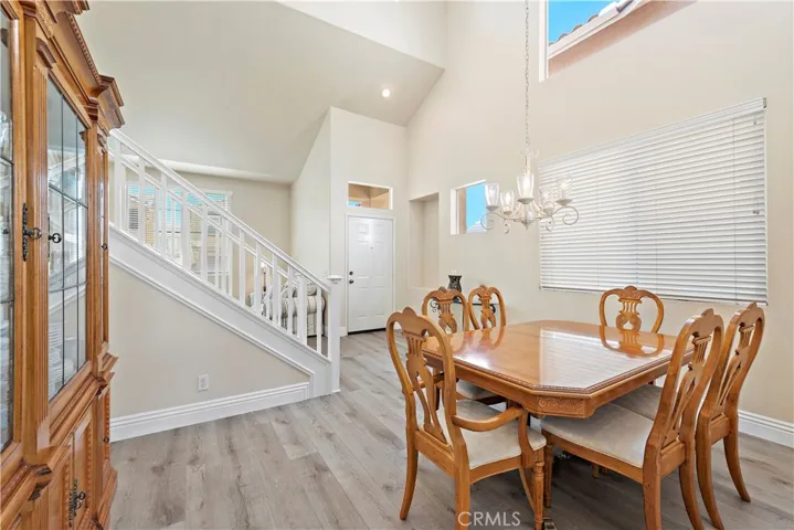 Another view of the dining room. Close to the living room but just separate enough to be it's own room. Lots of natural light with the abundance of windows.