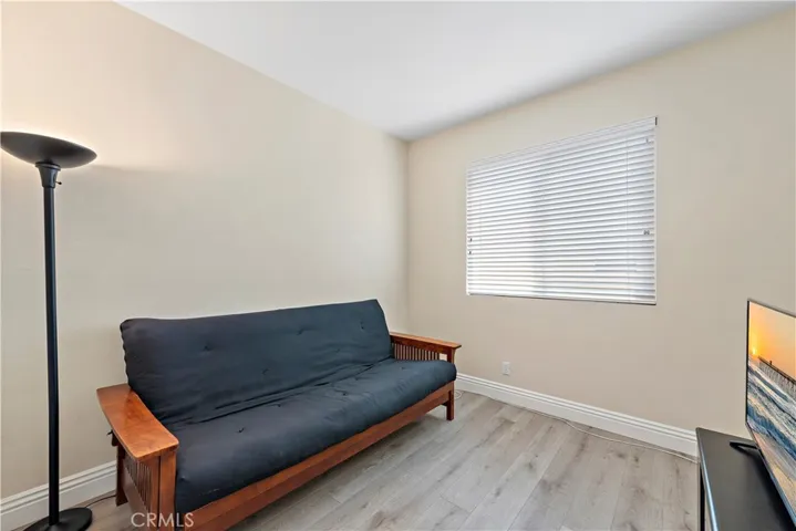 Secondary bedroom which is currently used as a den but has a full closet.