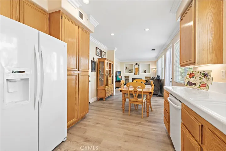 The kitchen leads to a second, less formal eating area and the family room. You will love the open-concept as it makes entertaining convenient and easy for families.