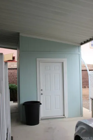 8' x 10' storage shed at carport