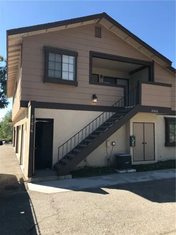 Living area is on the second level above the garage. One assigned parking spot included.