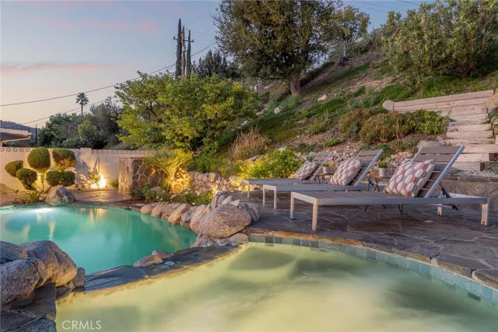 Zen inspired waterfall and pool layout
