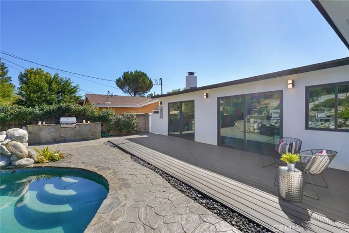 Modern Trex Decking Leading to Pool/ Spa