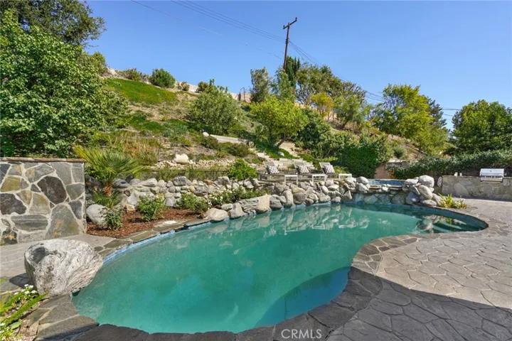 Newly redone pool with waterfall features