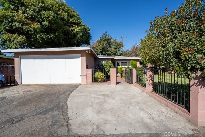2-car garage with gated entrance