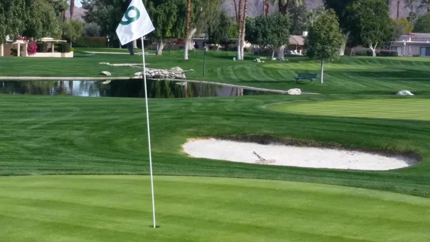 Golf 9 with sand trap and lake