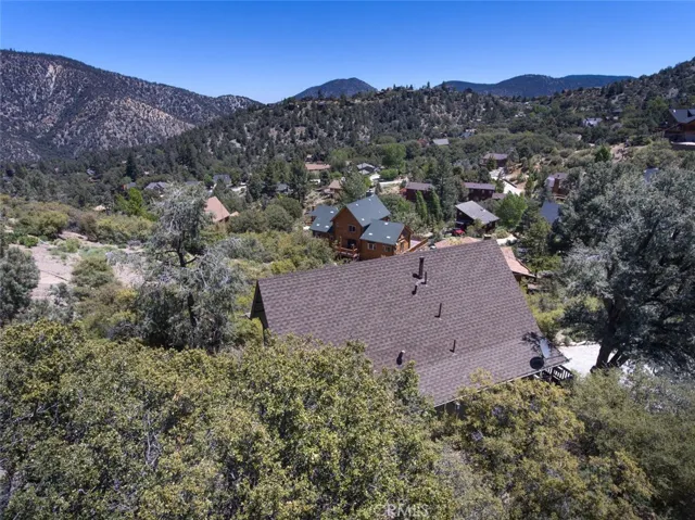 View of home from the upper edge of the lot.