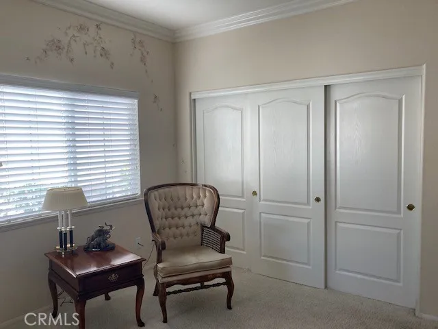 This bedroom has a large wall closet.