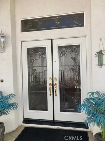 Spectacular leaded glass entry doors.