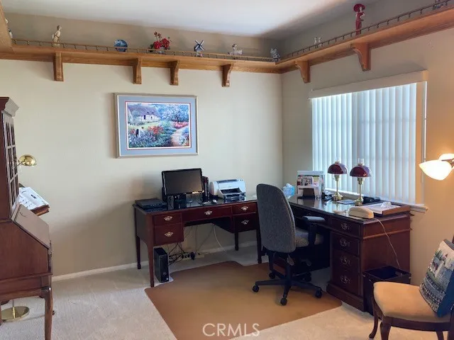 Bedroom or office with a walk-in closet.
