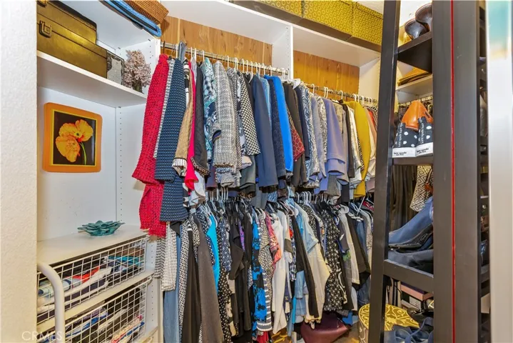 Huge Walk in Closet with Mirrored Doors