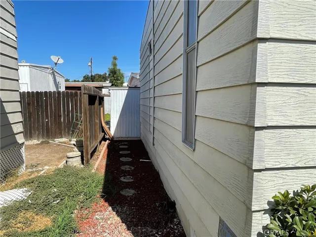 Behind house