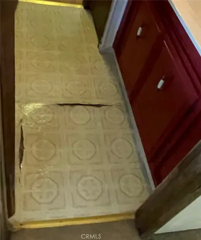 Damage on 2nd bathroom floor