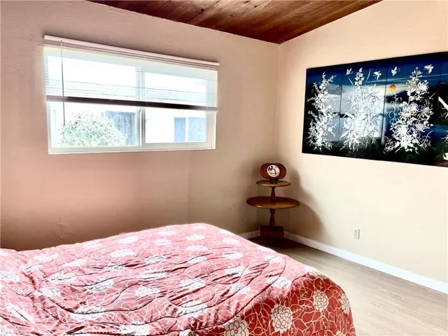 Master bedroom w/ dual pane windows and high ceilings