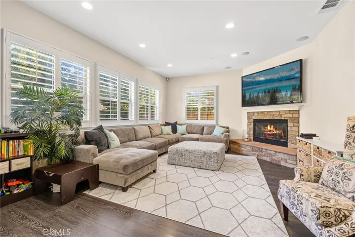 Family Room with abundant natural light and 10ft ceilings