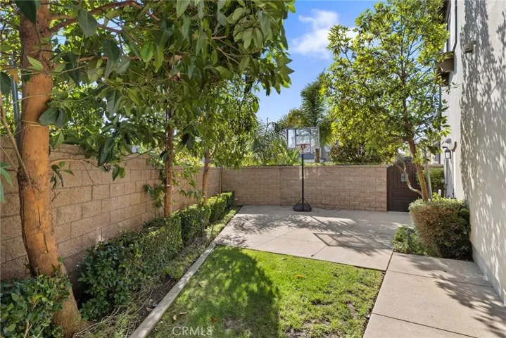Spacious side yard  adjacent to the BBQ Island area