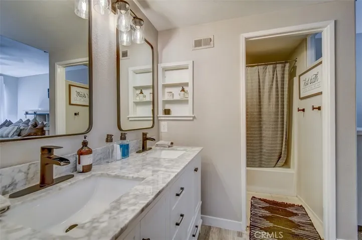 Large Vanity with Double Sinks , Granite Counter and New Lighting and Mirrors ,New Hardware