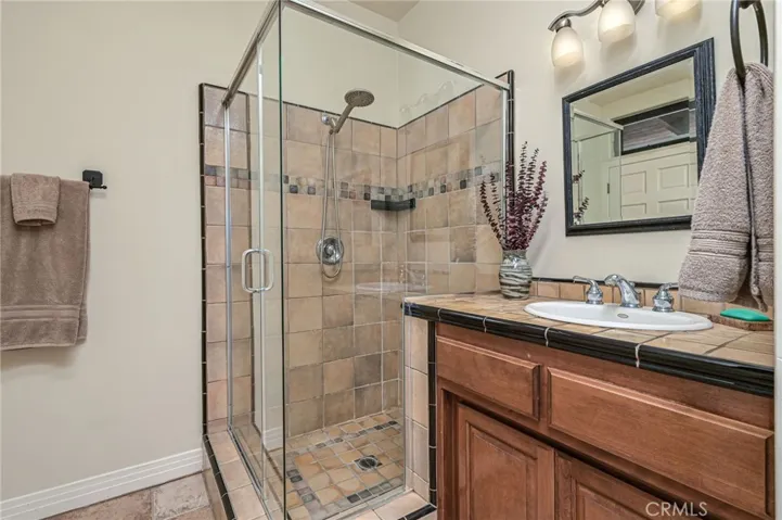 Bedroom 2 en-suite with shower and direct access to side yard