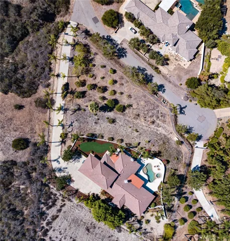 Drone shot of home and lower portion of FENCED 2.5 acres