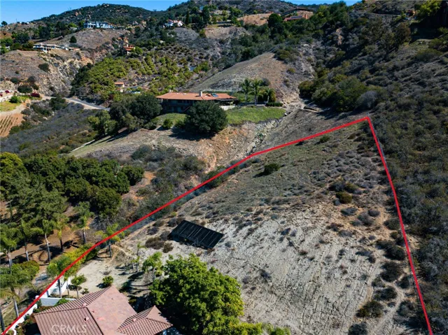 Drone shot showing fence line on upper side of 2.6 acres