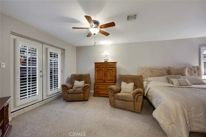 Sitting Area in Main Floor Master with Direct Access to Backyard