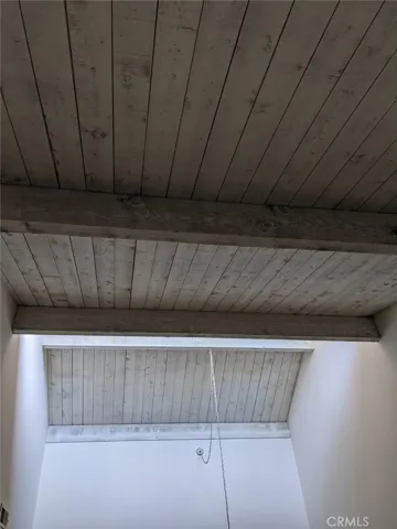High wood panels  ceiling.