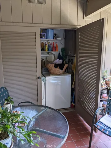 Washer and dryer in the patio closet.