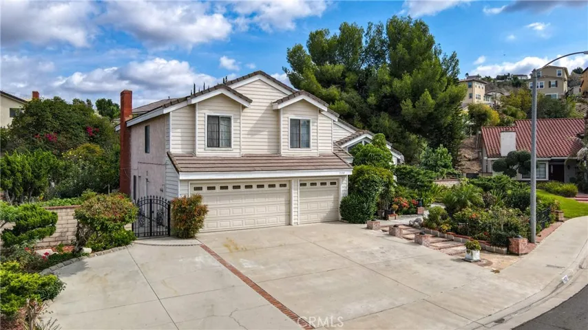 Ample parking space with 3 car garage and large driveway