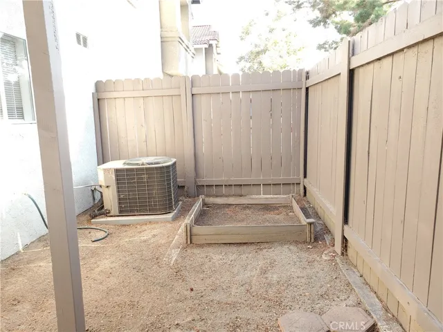 Patio with raised veggie/herb bed