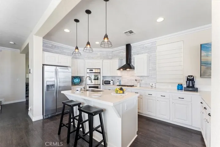 Custom cabinets and quartz counters.