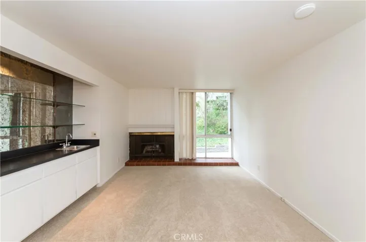 Living Room w/Wet Bar & Fireplace