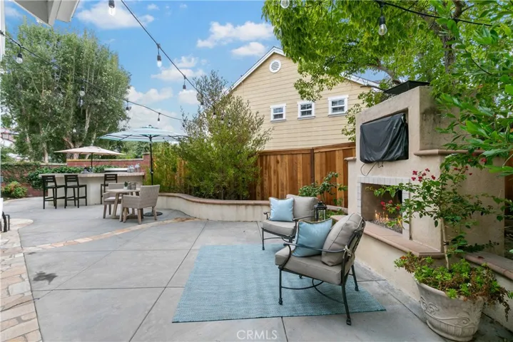 Fireplace/outdoor TV space.