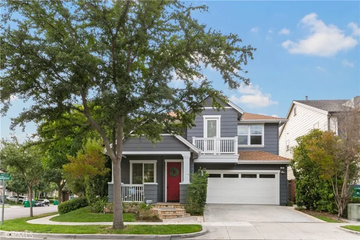 Farmhouse style home on corner lot.