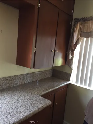 Close up of the kitchen cabinets and granite countertop