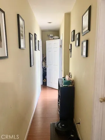 Hallway with floor furnace centrally located to keep the entire house warm in winter