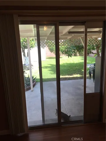 Back bedroom slider to covered patio