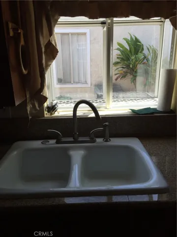 Close up of the kitchen sink and garden window