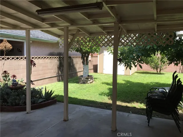 View of the back yard from the covered patio
