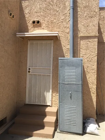 Back door to the driveway. Newer water heater