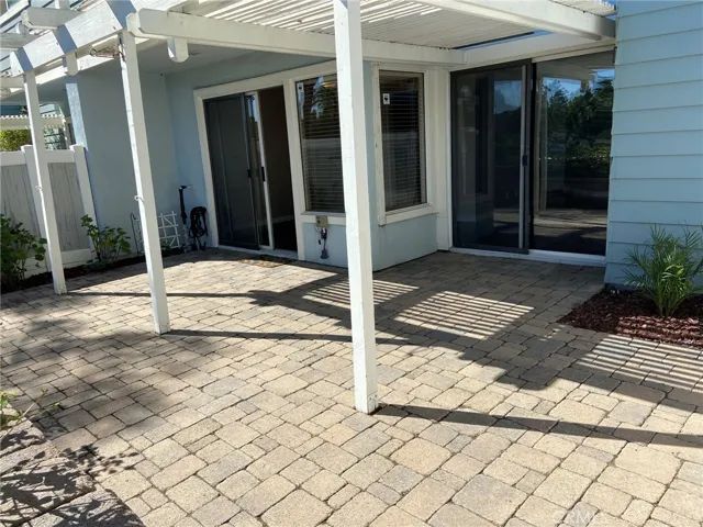 Back patio large enough for both a dining table....