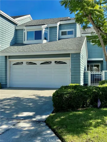View home with two car and full driveway....