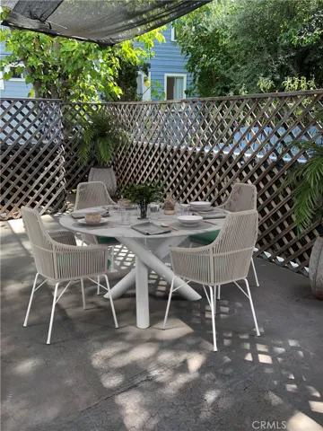 Enjoy the "zen like" view of the secret garden and beautiful foliage from the huge entertaining deck. Perfect for a BBQ, relaxing, or alfresco dining while listing to the sound of birds chirping.