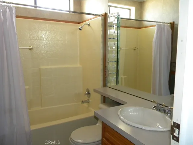Hall bath with tub and shower