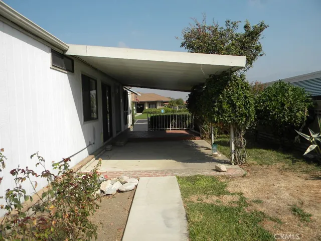 Side yard and covered patio area