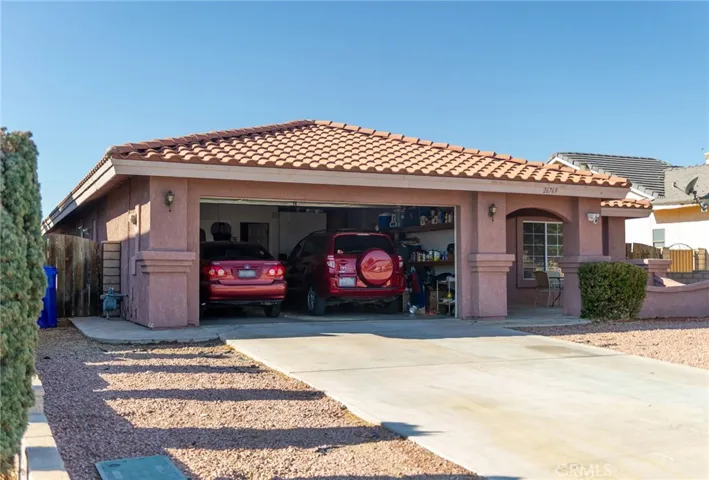 Easily fits 2 cars and a motorcycle