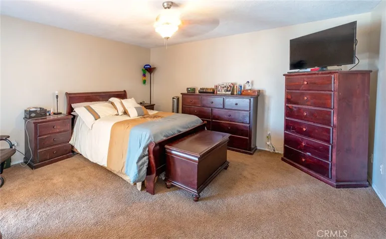 Very spacious master bedroom with sliding glass door access to the sunroom