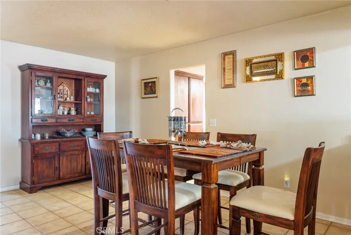 Formal dining room adjacent to kitchen and living room