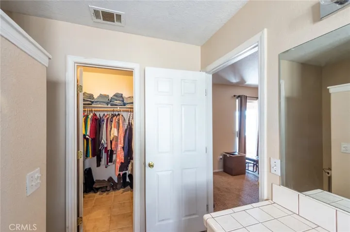 Master bath with walk in closet i