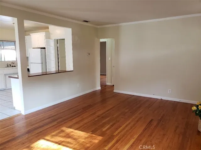 Living room with a partial view into the kitchen